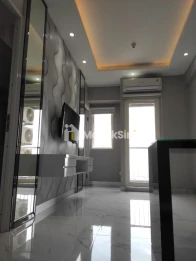 Sewa Unit Apartemen Terawat 2BR di Puncak Dharmahusada Surabaya.